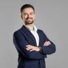 Portrait,Of,Smiling,Banker,With,Crossed,Arms,On,Grey,Background Portrait,Of,Smiling,Banker,With,Crossed,Arms,On,Grey,Background